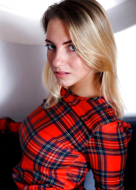 Svelte blonde young Angelica Rosenburg in skirt reveals big boobies and masturbates 